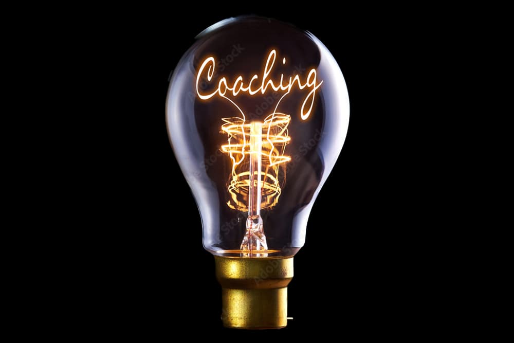 Lightbulb that says coaching